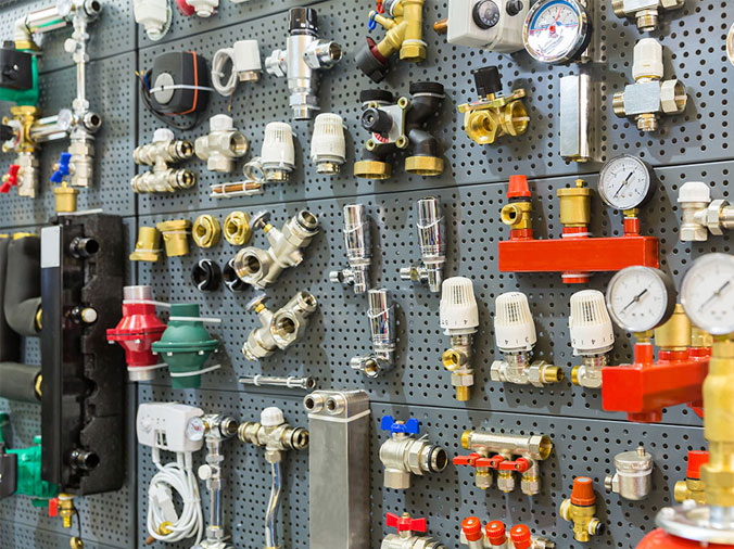 Various plumbing fittings in a plumbing supply shop